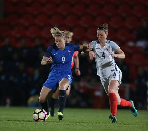 Eugenie Le Sommer of France tussles with Jade Moore of England during the women International Friendly Länderspiel match at the Keepmoat Stadium, Doncaster. Picture date: October 21st, 2016. Pic Simon Bellis Sportimage EDITORIAL USE ONLY. No use with unauthorised audio, video, data, fixture lists, club league logos or live services. Online in-match use limited to 120 images, no video emulation. No use in betting, games or single club league player publications.