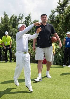 October 23, 2016 - Haikou, Hainan, China - Golfer Gary Player joins basketballer Yao Ming (R) for a basketball shoot out on the 17th tee at the Blackstone course in Mission Hills resort Haikou during the 2nd round of the 4th World celebrity Pro-am. .Blackstone course, Mission Hills resort, Haikou, Hainan Island China. Round 2 of the Mission Hills 4th World celebrity Pro-Am tournament 2016 - ZUMAr144 20161023_zap_r144_029
