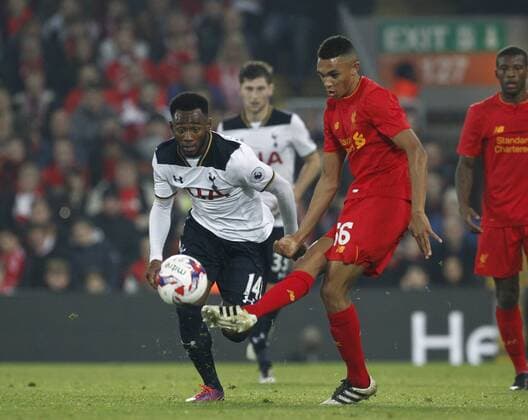 25.10.2016. Anfield, Liverpool, England. EFL Cup. Liverpool versus Tottenham Hotspur. Liverpool midfielder Trent Alexander-Arnold, making his debut for Liverpool tonight, passes as Tottenham midfielder Georges-Kevin Nkoudou challenges. xAlanxMartinx  ActionPlus11804634