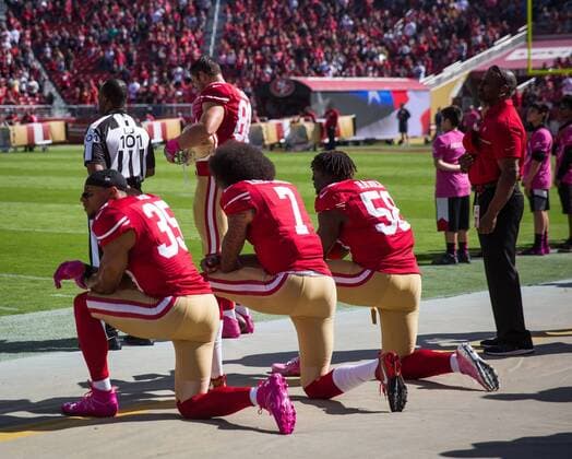 October 23, 2016 - Florida, U.S. - LOREN ELLIOTT Times .From left, San Francisco 49ers free safety Eric Reid (35), quarterback Colin Kaepernick (7) and outside linebacker Eli Harold (58) kneel during the national anthem before a football game between the Tampa Bay Buccaneers and San Francisco 49ers at Levi s Stadium in Santa Clara, Calif., on Sunday, Oct. 23, 2016. NFL American Football Herren USA 2016 - Tampa Bay Buccaneers - ZUMAs70_ 20161023_zan_s70_050