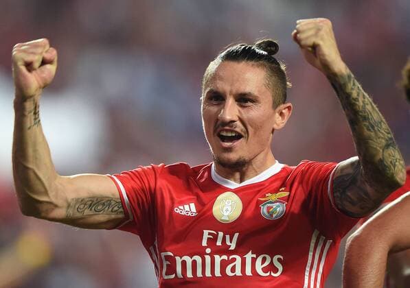 Benfica s Fejsa celebrates after his teammate G. Guedes scored a goal during the Portuguese league football match between SL Benfica and FC P.Ferreira at Luz Stadium in Lisbon, Portugal, Oct. 28, 2016. Benfica won 3-0. ) (SP)PORTUGAL-LISBON-FOOTBALL ZhangxLiyun 