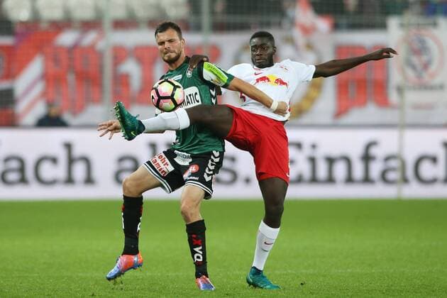 SOCCER - BL, RBS vs Ried SALZBURG,AUSTRIA,29.OCT.16 - SOCCER - tipico Bundesliga, Red Bull Salzburg vs SV Ried. Image shows Orhan Ademi (Ried) and Dayot Upamecano (RBS). GEPAxpictures xMathiasxMandl