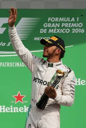 British driver Lewis Hamilton, from Mercedes team, celebrates his victory at the Grand Prix of Formula One of Mexico at Autodromo Hermanos Rodriguez in Mexico City, Mexico, 30 October 2016. EFE Jose Mendez Mexico s Formula One Grand Prix !ACHTUNG: NUR REDAKTIONELLE NUTZUNG!  MEX134 74177171st