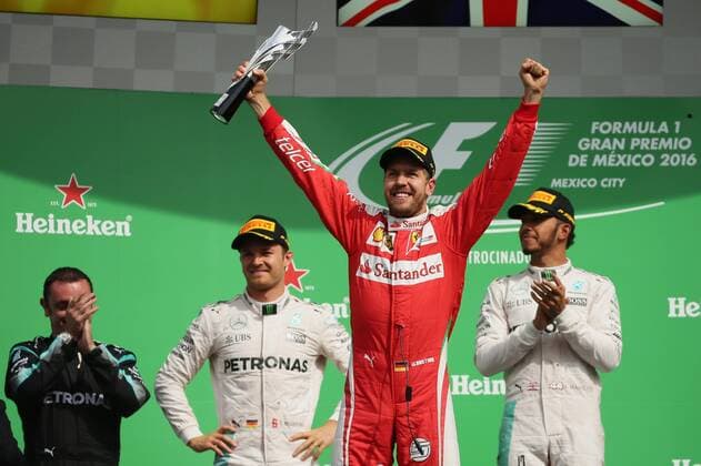German driver Sebastian Vettel (C) from Ferrari celebrates his victory after Mexico s Formula One Grand Prix, held at Autodromo Hermanos Rodriguez, in Mexico City, Mexico, 30 October 2016. EFE Jose Mendez Mexico s Formula One Grand Prix !ACHTUNG: NUR REDAKTIONELLE NUTZUNG!  MEX134 74177604st