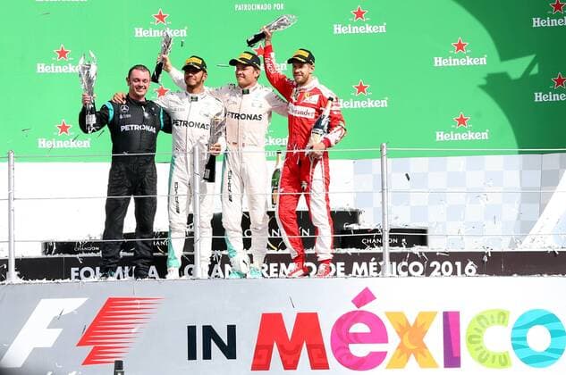 (161031) -- MEXICO CITY, Oct. 30, 2016 -- Mercedes team coordinator Tony Walton, Mercedes British driver Lewis Hamilton, Mercedes German driver Nico Rosberg and Ferrari German driver Sebastian Vettel (from L to R) pose on the podium after the Formula One Mexico Grand Prix in Mexico City, capital of Mexico, Oct. 30, 2016. ) (vf) (ah) (SP)MEXICO-MEXICO CITY-SPORTS-F1 STR 