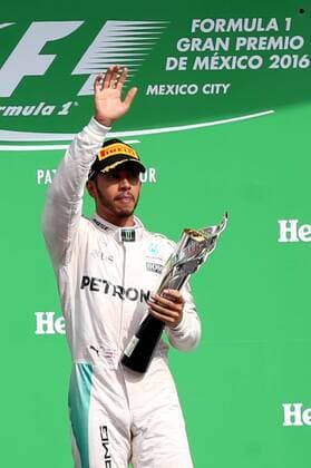 (161031) -- MEXICO CITY, Oct. 30, 2016 -- Mercedes British driver Lewis Hamilton celebrates on the podium after the Formula One Mexico Grand Prix in Mexico City, capital of Mexico, Oct. 30, 2016. ) (vf) (ah) (SP)MEXICO-MEXICO CITY-SPORTS-F1 STR 