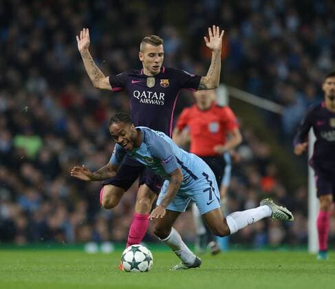 Raheem Sterling of Manchester City brought down by Lucas Digne of Barcelona during the Champions League Group C match at the Etihad Stadium, Manchester. Picture date: November 1st, 2016. Pic Simon Bellis Sportimage EDITORIAL USE ONLY. No use with unauthorised audio, video, data, fixture lists, club league logos or live services. Online in-match use limited to 120 images, no video emulation. No use in betting, games or single club league player publications.