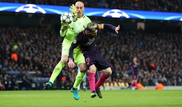 Football - 2016 2017 UEFA Champions League - Group C: Manchester City vs. Barcelona Willy Caballero of Manchester City grabs the ball ahead of Lionel Messi of Barcelona during the match at The Etihad Stadium. COLORSPORT LYNNE CAMERON 