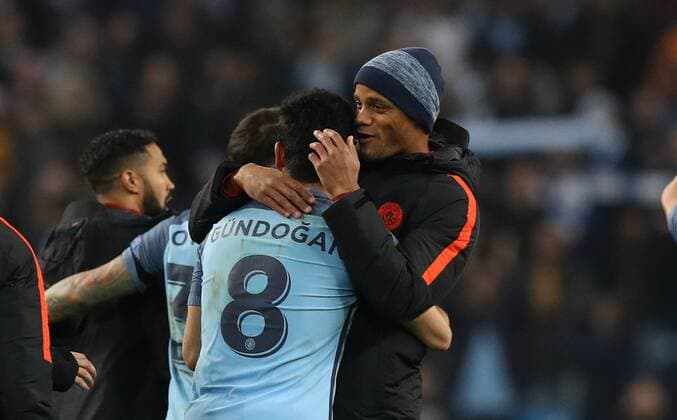 Football - 2016 2017 UEFA Champions League - Group C: Manchester City vs. Barcelona Vincent Company of Manchester City congratulates Ilkay Gundogan of Manchester City after the match at The Etihad Stadium. COLORSPORT LYNNE CAMERON 