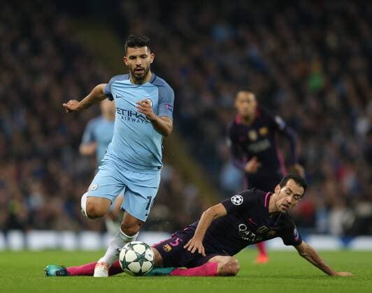 Sergio Aguero of Manchester City and Sergio Busquets of Barcelona during the Champions League Group C match at the Etihad Stadium, Manchester. Picture date: November 1st, 2016. Pic Simon Bellis Sportimage EDITORIAL USE ONLY. No use with unauthorised audio, video, data, fixture lists, club league logos or live services. Online in-match use limited to 120 images, no video emulation. No use in betting, games or single club league player publications.