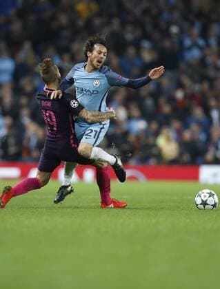 (161102) -- MANCHESTER, Nov. 2, 2016 -- David Silva (R) of Manchester City is tackled by Lucas Digne of Barcelona during their UEFA Champions League Group C match at Etihad Stadium in Manchester, Britain, on Nov. 1, 2016. Manchester City won 3-1. ) (SP)BRITAIN-MANCHESTER-SOCCER-UEFA CHAMPIONS LEAGUE-MAN CITY VS BARCELONA HanxYan 