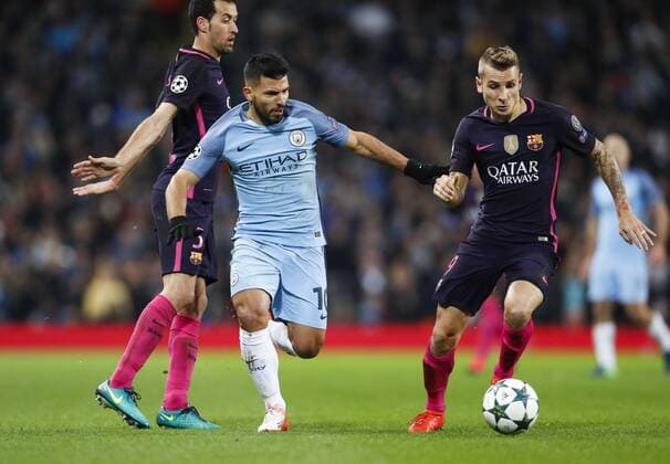 (161102) -- MANCHESTER, Nov. 2, 2016 -- Sergio Aguero (C) of Manchester City vies for the ball during the UEFA Champions League Group C match between Manchester City and Barcelona at Etihad Stadium in Manchester, Britain, on Nov. 1, 2016. Manchester City won 3-1. ) (SP)BRITAIN-MANCHESTER-SOCCER-UEFA CHAMPIONS LEAGUE-MAN CITY VS BARCELONA HanxYan 