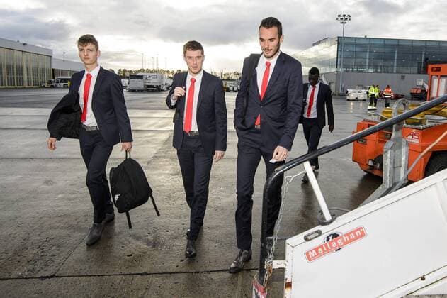Standard s Corentin Fiore and Standard s goalkeeper Guillaume Hubert pictured during the departure of Belgian first league soccer team Standard de Liege to Athens, Greece, Wednesday 02 November 2016, from Liege Airport. Tomorrow Standard is playing the fourth game of the group stage of the Europa League competition against Greek club Panathinaikos F.C., in Group G. NICOLASxLAMBERT  x04971124x