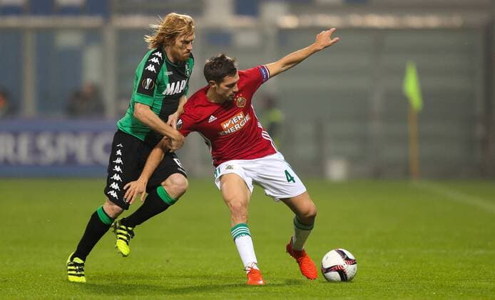 SOCCER - EL, Sassuolo vs Rapid REGGIO EMILIA,ITALY,03.NOV.16 - SOCCER - UEFA Europa League, group stage, US Sassuolo Calcio vs SK Rapid Wien. Image shows Davide Biondini (Sassuolo) and Thomas Schrammel (Rapid). Keywords: Wien Energie. GEPAxpictures xPhilippxBrem