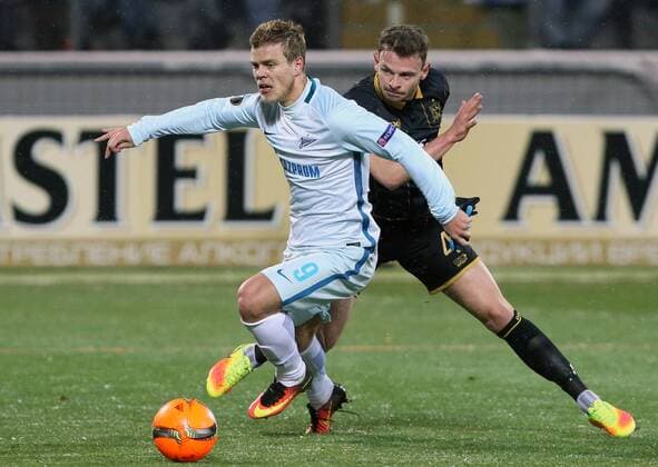 ST PETERSBURG, RUSSIA - NOVEMBER 3, 2016: Zenit St Petersburg s Alexander Kokorin (L) and Dundalk s Andy Boyle fight for the ball in their 2016-17 Season UEFA Europa League Group D football match at the Petrovsky Stadium. Peter Kovalev TASS  TS03673B