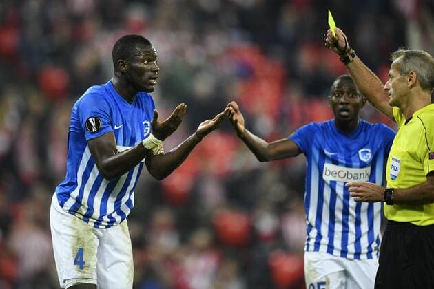 Genk s Omar Colley receives a yellow card from referee Martin Atkinson during a soccer game between Spanish Club Athletic Bilbao and Belgian team KRC Genk in Bilbao, Spain, Thursday 03 November 2016, the fourth game of the group stage of the Europa League competition in Group F. YORICKxJANSENS  x04971713x