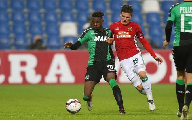 SOCCER - EL, Sassuolo vs Rapid REGGIO EMILIA,ITALY,03.NOV.16 - SOCCER - UEFA Europa League, group stage, US Sassuolo Calcio vs SK Rapid Wien. Image shows Claud Adjapong (Sassuolo) and Thomas Murg (Rapid). Keywords: Wien Energie. GEPAxpictures xPhilippxBrem