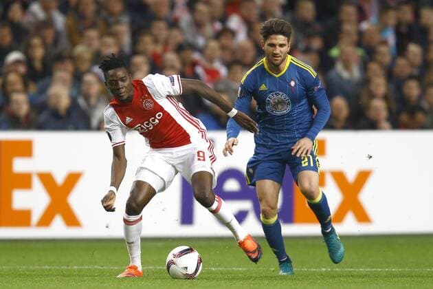 (l-r) Bertrand Traore of Ajax Amsterdam, Carles Planas of Celta de Vigoduring the UEFA Europa League group G match between Ajax Amsterdam and Celta de Vigo at the Amsterdam Arena on November 3, 2016 in Amsterdam, The Netherlands Ajax v Celta de Vigo UEFA Europa League 2016 2017 xVIxxIVx 6516783