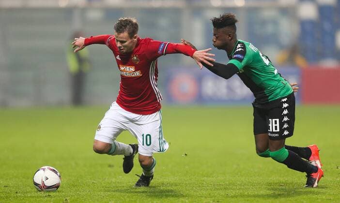 SOCCER - EL, Sassuolo vs Rapid REGGIO EMILIA,ITALY,03.NOV.16 - SOCCER - UEFA Europa League, group stage, US Sassuolo Calcio vs SK Rapid Wien. Image shows Louis Schaub (Rapid) and Claud Adjapong (Sassuolo). Keywords: Wien Energie. GEPAxpictures xPhilippxBrem