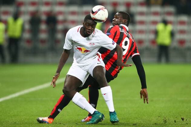 SOCCER - EL, Nice vs RBS NICE,FRANCE,03.NOV.16 - SOCCER - UEFA Europa League, group stage, OGC Nice vs Red Bull Salzburg. Image shows Dayot Upamecano (RBS) and Mario Balotelli (Nice). GEPAxpictures xFelixxRoittner