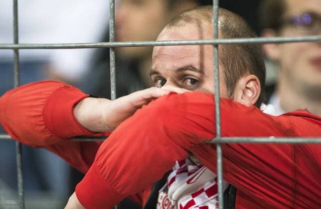 Mainz supporter looks dejected after a soccer game between Belgian team RSC Anderlecht and German club 1. FSV Mainz 05, Thursday 03 November 2016 in Brussels, the fourth game of the group stage of the Europa League competition in the group C. LAURIExDIEFFEMBACQ  x04971882x