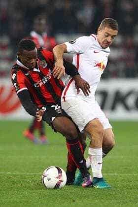 SOCCER - EL, Nice vs RBS NICE,FRANCE,03.NOV.16 - SOCCER - UEFA Europa League, group stage, OGC Nice vs Red Bull Salzburg. Image shows Wylan Cyprien (Nice) and Josip Radosevic (RBS). GEPAxpictures xFelixxRoittner