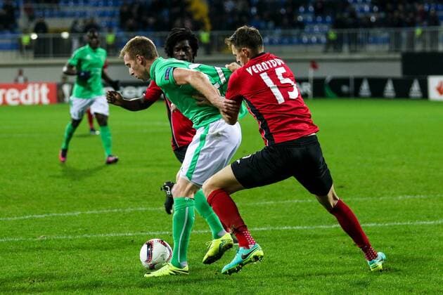 Azerbaijan: Europa League: FC Qabala - Saint Etienne Saint Etienne Robert Beric (27) vies for the ball with FC Qabala s Vitaliy Vernydub (15) during the Europa League match between FC Qabala and Saint Etienne at 8km stadium in Baku.  AzizxKarimov PacificxPress