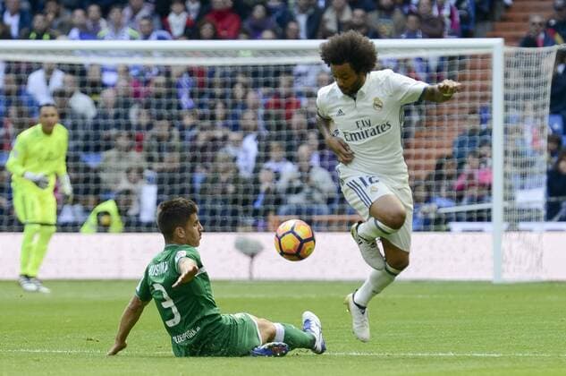 Real Madrid s player Marcelo and Leganes s player Unai Bustinza during a match of La Liga at Santiago Bernabeu Stadium in Madrid. November 06, Spain. 2016.  (20161106045)