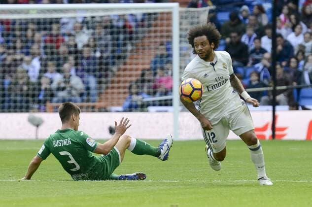 Real Madrid s player Marcelo and Leganes s player Unai Bustinza during a match of La Liga at Santiago Bernabeu Stadium in Madrid. November 06, Spain. 2016.  (20161106046)