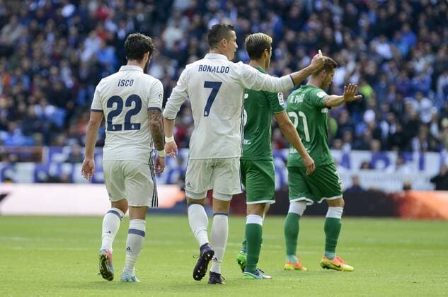 Real Madrid s player Francisco Roman Isco and Cristiano Ronaldo and Leganes s player Martin Maximiliano Mantovani and Ruben Perez during a match of La Liga at Santiago Bernabeu Stadium in Madrid. November 06, Spain. 2016.  (20161106042)