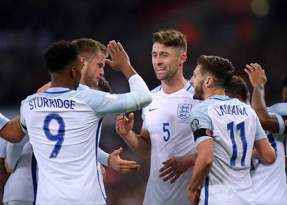 11.11.2016. Wembley Stadium, London, England. World Cup Qualifying Football. England versus Scotland. Gary Cahill celebrates with Adam Lallana and Daniel Sturridge after heading past Scotland Keeper Craig Gordon making it 3-0 xMarkxKertonx  ActionPlus11808501