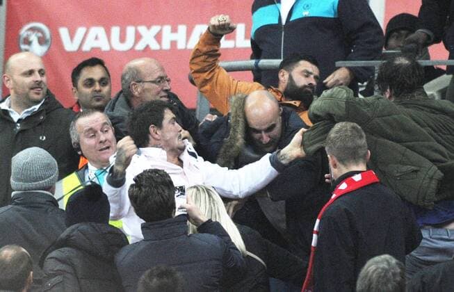 Football - 2016 2017 World Cup Qualifier - Group F: England vs. Scotland Fighting breaks out after the third goal at Wembley. COLORSPORT ANDREW COWIE 