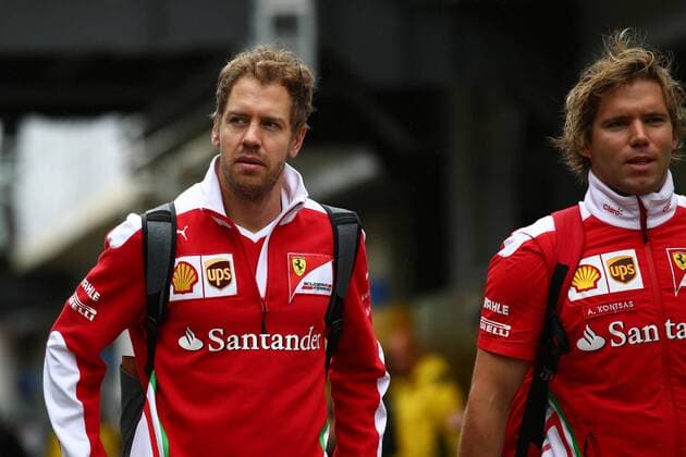Brazilian Grand Prix, Sao Paulo 10 - 13 November 2016 12.11.2016 - Sebastian Vettel (GER) Scuderia Ferrari SF16-H and Antti Kontsas (FIN) Personal Trainer 