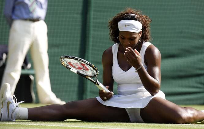 090701) -- LONDON, July 1, 2009 -- Serena Williams of the United States of America falls down during the Ladies Singles Quarterfinals against Victoria Azarenka of Belarus at the Centre Court in the 2009 Wimbledon Tennis Championships in Wimbledon of London, UK, June 30, 2009. Serena Williams won 2-0. ) (xm) 19)UK-LONDON-WIMBLEDON-DAY 8-SERENA WILLIAMS VS AZARENKA  - ZUMAx10_ 20090701_zaf_x10_109