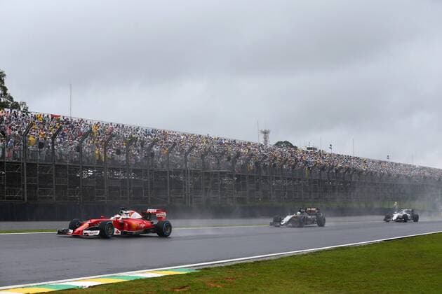 Brazilian Grand Prix, Sao Paulo 10 - 13 November 2016 13.11.2016 - Race, Sebastian Vettel (GER) Scuderia Ferrari SF16-H and Nico Hulkenberg (GER) Sahara Force India F1 VJM09 
