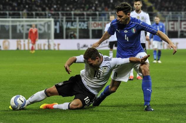 15.11.2016. San Siro, Milan, Italy. International Friendly LÃ¤nderspiel Football, Italy versus Germany. Joshua Kimmich of Germany goes down under contact from Matteo Darmian of Italy xGaetanoxPiazzollax  ActionPlus11810162