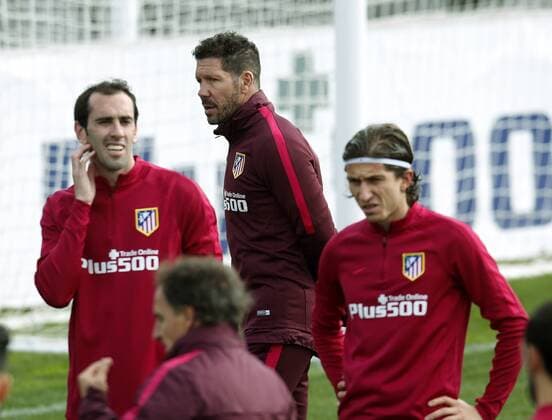 Godin, Simeone and Filipe Luis. Atletico training session. In this picture, Godin, Simeone and Filipe Luis. xFOTOxCHEMAxREYx 