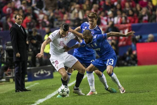 November 22, 2016 - Seville, Spain - Vitolo of Sevilla (L ) fights for the ball with Daniel Alves of Juventus (R ) during the UEFA Champions League Group H soccer match between Sevilla FC and Juventus at Estadio Ramon Sanchez Pizjuan Soccer 2016 - Sevilla FC vs Juventus - ZUMAa142 20161122_zap_a142_019