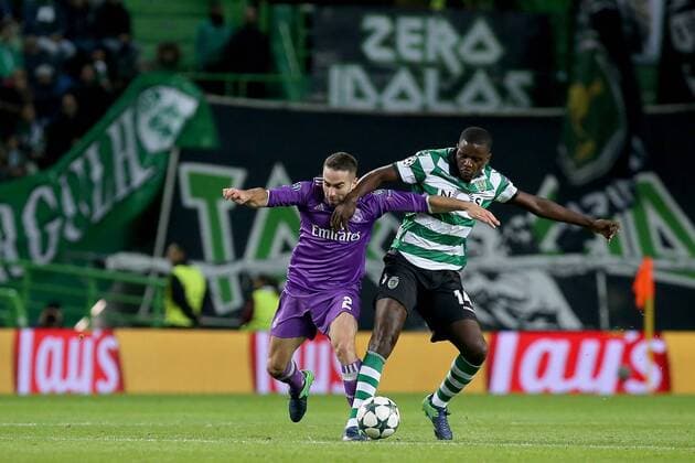 November 22, 2016 - Lisbon, Aveiro, Portugal - Real Madrids defender Dani Carvajal from Spain (L) and Sportings midfielder William Carvalho from Portugal (R) in action during the UEFA Champions League match between Sporting Clube de Portugal and Real Madrid at Estadio Jose Alvalade on November 22, 2016 in Lisbon, Portugal. Sporting CP v Real Madrid - UEFA Champions League 2016 17  - ZUMAn230 20161122_zaa_n230_422