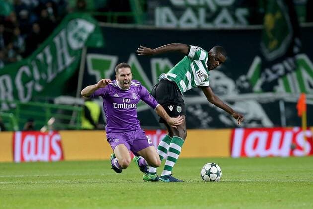 November 22, 2016 - Lisbon, Aveiro, Portugal - Real Madrids defender Dani Carvajal from Spain (L) and Sportings midfielder William Carvalho from Portugal (R) in action during the UEFA Champions League match between Sporting Clube de Portugal and Real Madrid at Estadio Jose Alvalade on November 22, 2016 in Lisbon, Portugal. Sporting CP v Real Madrid - UEFA Champions League 2016 17  - ZUMAn230 20161122_zaa_n230_424