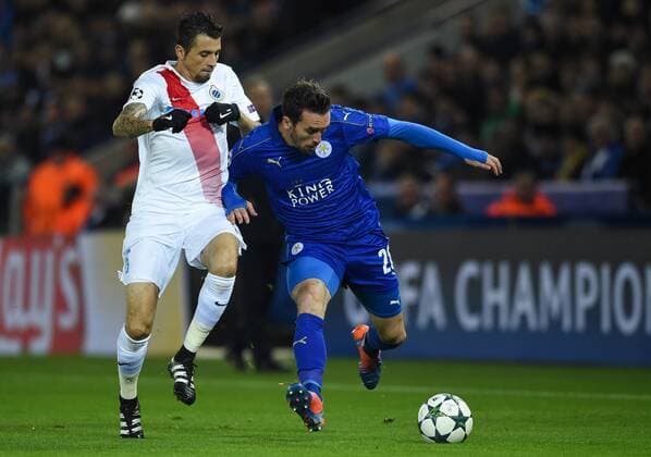 LEICESTER, Nov. 22, 2016 -- Christian Fuchs (R) of Leicester City is challenged by Claudemir of Club Brugge during the UEFA Champions League Group G Match between Leicester City and Club Brugge at the King Power Stadium in Leicester, Britain on Nov. 22, 2016. Leicester City won 2-1. )(wll) (SP)BRITAIN-LEICESTER-SOCCER-UEFA CHAMPIONS LEAGUE-LEICESTER CITY VS CLUB BRUGGE JonxBuckle 