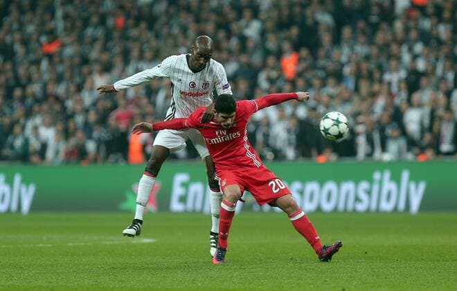 Besiktas Atiba Hutchinson and Benfica s Goncalo Guedes vie for the ball during a UEFA Champions League, group B soccer match, between Besiktas and Benfica at Vodafone Arena in Istanbul, 23rd of November, 2016. (Tolga Adanali - Depo Photos)  15566008