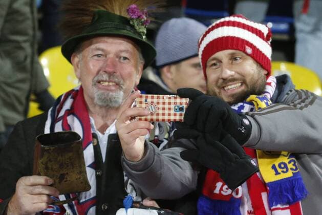 ROSTOV-ON-DON, RUSSIA - NOVEMBER 23, 2016: FC Bayern Munichâ€™s fans make a selfie at their 2016 17 UEFA Champions League Group D Round 5 football match against FC Rostov at the Olimp-2 Stadium. Rostov won the game 3-2. Valery Matytsin TASS  TS0389C1