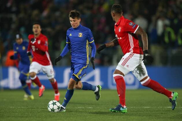 November 23, 2016 - Rostov-On-Don, Russia - Dmitri Poloz (C) of FC Rostov vie for the ball during the UEFA Champions League Group D football match between FC Bayern Munich and FC Rostov, at Olimp 2 Stadium in Rostov-on-Don, Russia on Novemberr 23, 2016. FC Rostov v FC Bayern Muenchen - UEFA Champions League  - ZUMAn230 20161123_zaa_n230_150