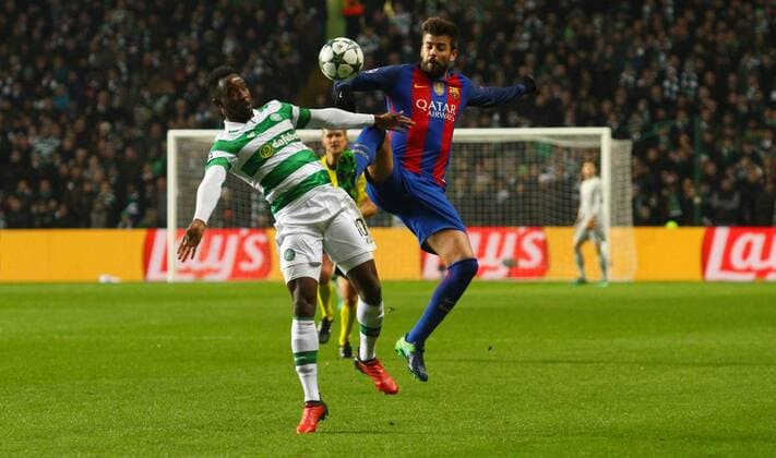 Football - 2016 2017 UEFA Champions League - Group C: Celtic vs. Barcelona Moussa Dembele of Celtic and Gerard PiquŽ of Barcelona , at Celtic Park. COLORSPORT 
