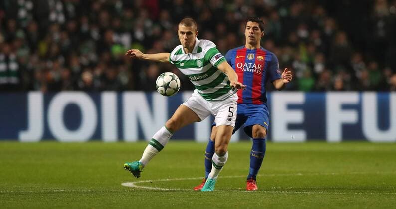 Football - 2016 2017 UEFA Champions League - Group C: Celtic vs. Barcelona Luis Suarez of Barcelona and Jozo Simunovic of Celtic, at Celtic Park. COLORSPORT 