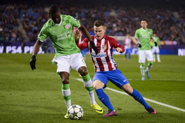 Atletico de Madrid s player Kevin Gameiro and PSV Eindhoven s player Nicolas Isimat-Mirin during a match of La Liga at Santiago Bernabeu Stadium in Madrid. November 06, Spain. 2016.  (20161123003)
