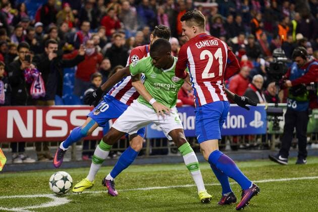 Atletico de Madrid s player Kevin Gameiro and Yannick Carrasco and PSV Eindhoven s player Nicolas Isimat-Mirin during a match of La Liga at Santiago Bernabeu Stadium in Madrid. November 06, Spain. 2016.  (20161123004)