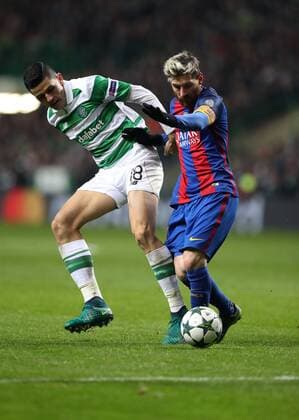 Lionel Messi of Barcelona and Tom Rogic of Celtic during the Champions League match at Celtic Park, Glasgow. Picture Date: 23rd November 2016. Pic taken by Lynne Cameron Sportimage EDITORIAL USE ONLY. No use with unauthorised audio, video, data, fixture lists, club league logos or live services. Online in-match use limited to 120 images, no video emulation. No use in betting, games or single club league player publications.