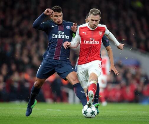 November 23, 2016 - London, England, United Kingdom - Arsenal s Aaron Ramsey gets tackled by Thiago Silva of Paris Saint-Germain during UEFA Champions League Group A match between Arsenal against Paris Saint-Germain at Emirates Stadium on November 23, 2016 in London, England. Arsenal FC v Paris Saint-Germain - UEFA Champions League  - ZUMAn230 20161123_zaa_n230_269